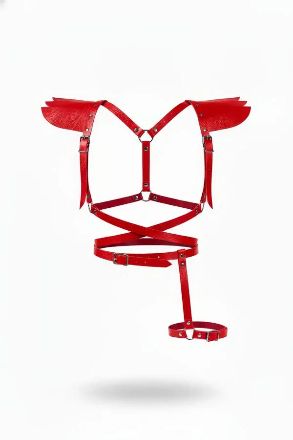 Red faux leather full body harness with sculpted layered shoulder pads, cross-chest straps, silver-tone hardware, and single 