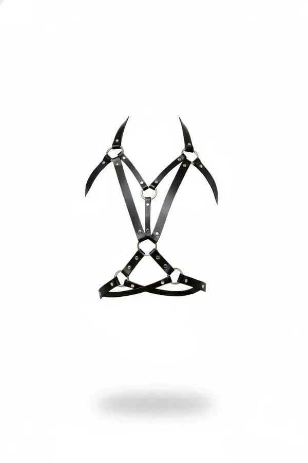 Black faux leather body harness with three silver O-rings, dome studs, and pointed shoulder strap tips, front view on white b