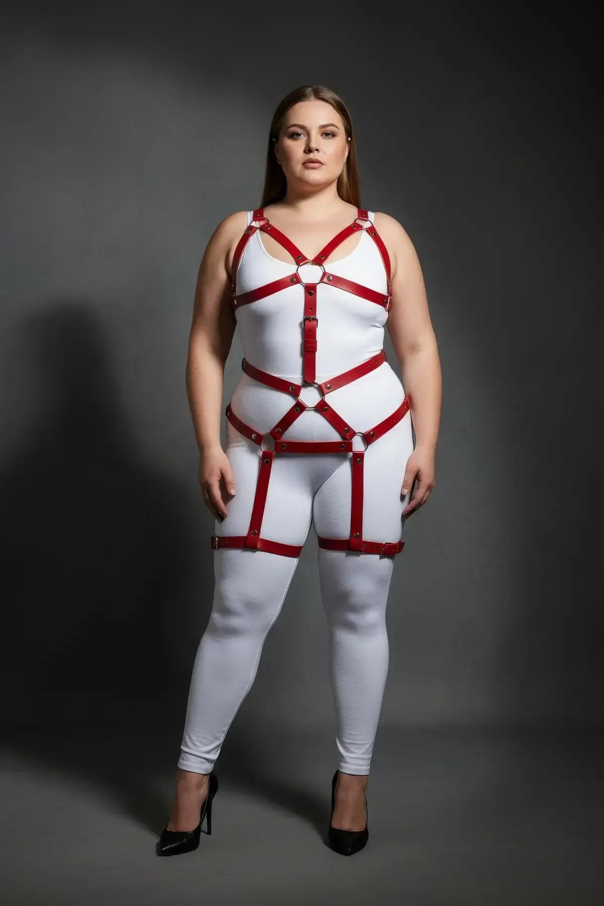 Side view of red faux leather body cage harness showing waist and hip strap configuration