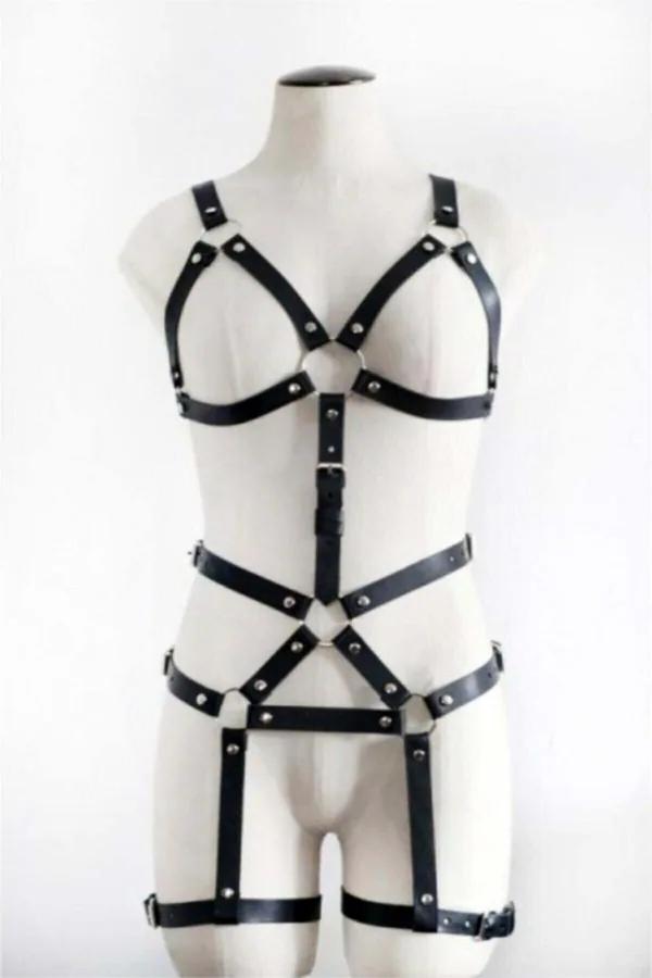 Black faux leather full body harness with silver O-rings, chest cage, waist band, and thigh garters on mannequin