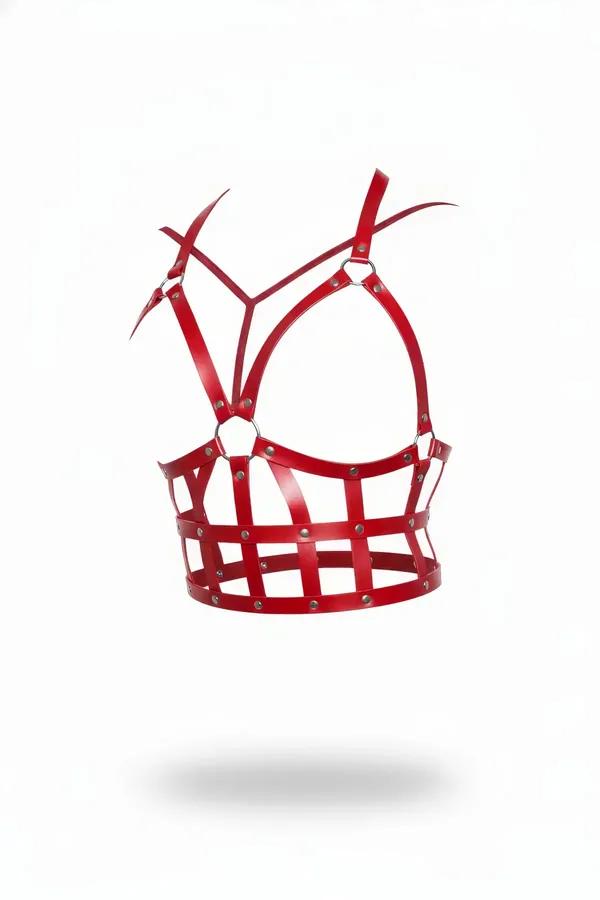 Red faux leather cage body harness top with silver studs and adjustable halter straps, front view