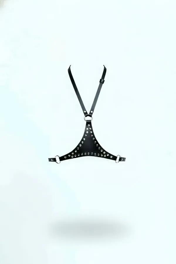 Black faux leather chest harness with silver dome studs triangular panel and three O-ring accents adjustable shoulder straps