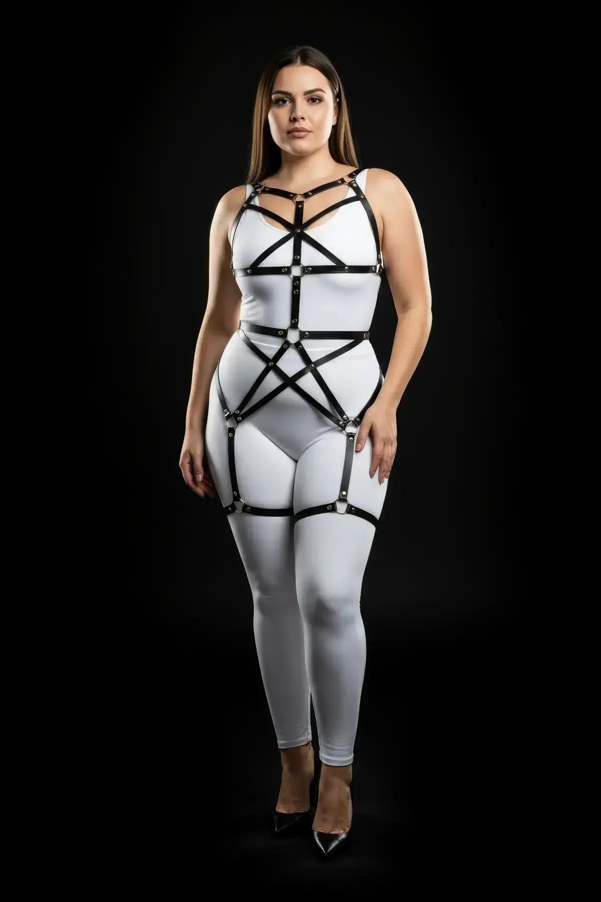 Rear view of black strappy cage harness showing back strap configuration and adjustable buckles