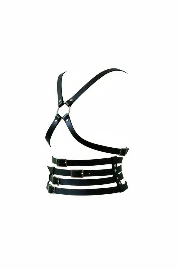 Black faux leather X-back chest harness with four-strap waspie waist and silver buckles, side-angled product view