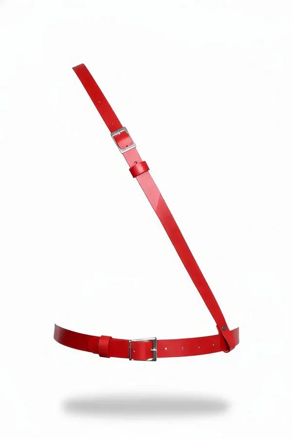 Red vegan leather asymmetric single shoulder waist harness with silver pin buckles and diagonal strap