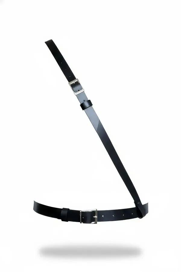 Black faux leather single shoulder body harness with diagonal strap and silver rectangular buckle waist band