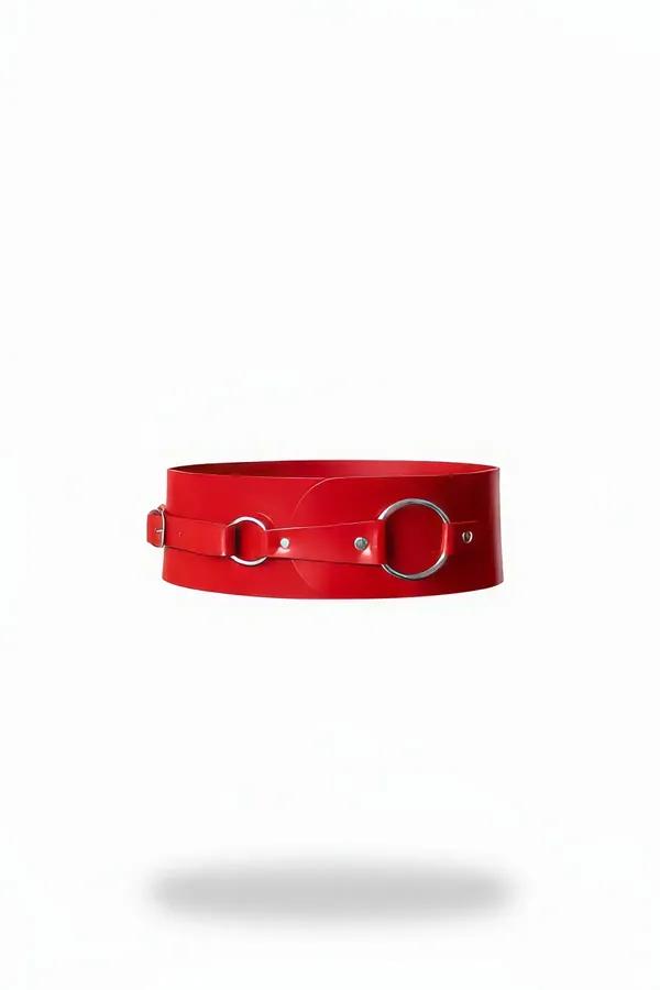 red faux leather wide waist harness with dual silver O-rings and pin buckle front view