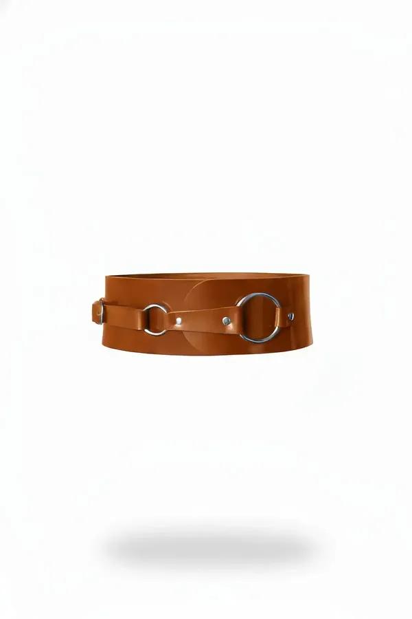 Cognac faux leather wide waist cinch belt with two silver O-rings on white background