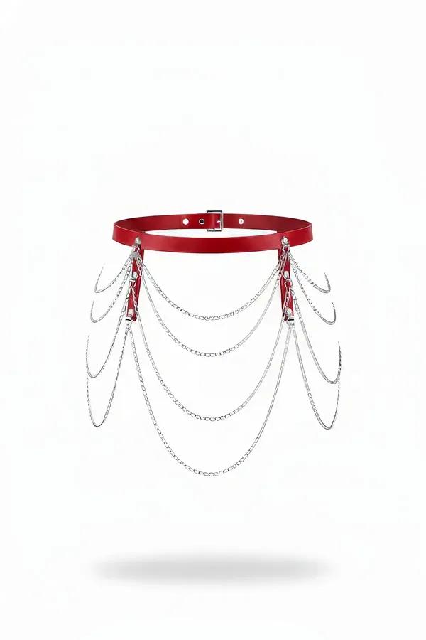 red faux leather waist belt with five layered silver curb chains draped from hip connectors on white background