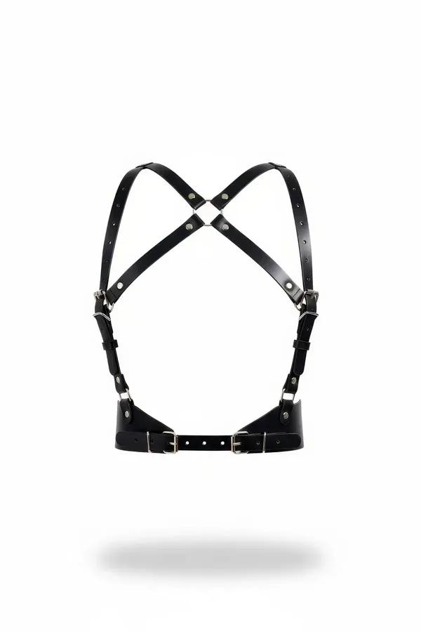 Black faux leather cross-back chest harness with X-strap configuration and dual silver pin-buckle underbust band