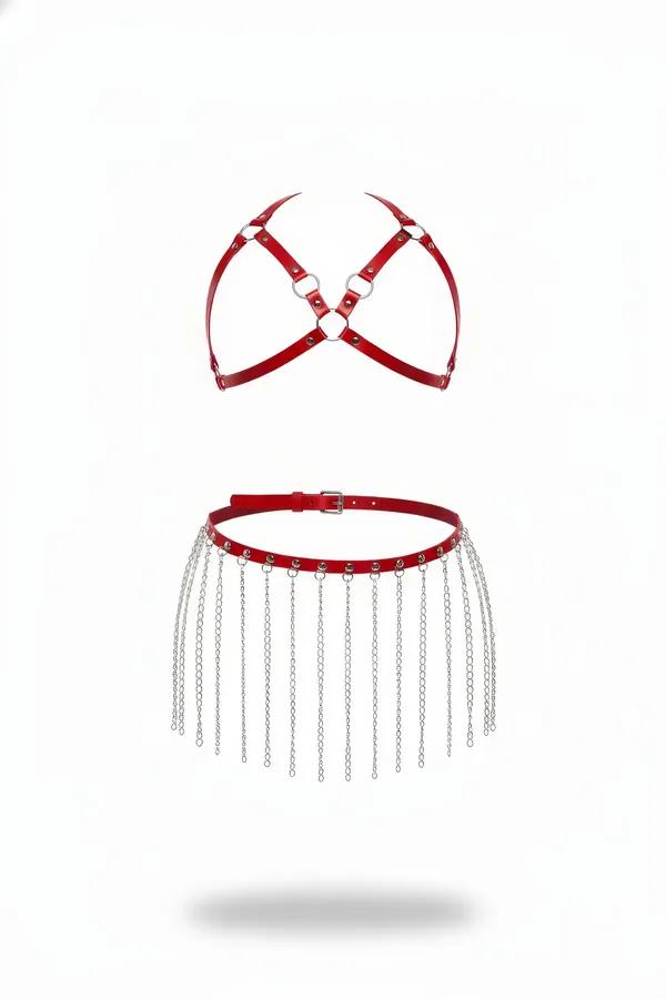 Red faux leather body harness set with silver O-ring chest piece and chain fringe skirt belt on white background