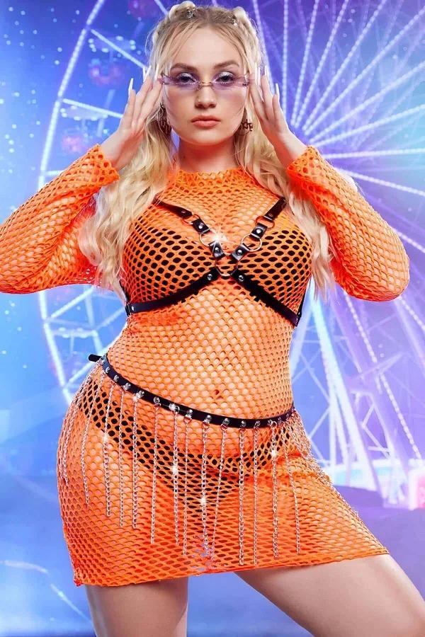 Black faux leather cage harness with silver D-rings and dangling chain belt worn over orange mesh outfit