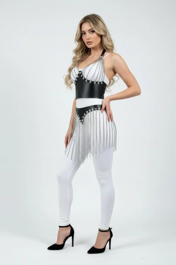 Black faux leather corset harness with rhinestone stud trim and cascading silver chain fringe, front three-quarter view