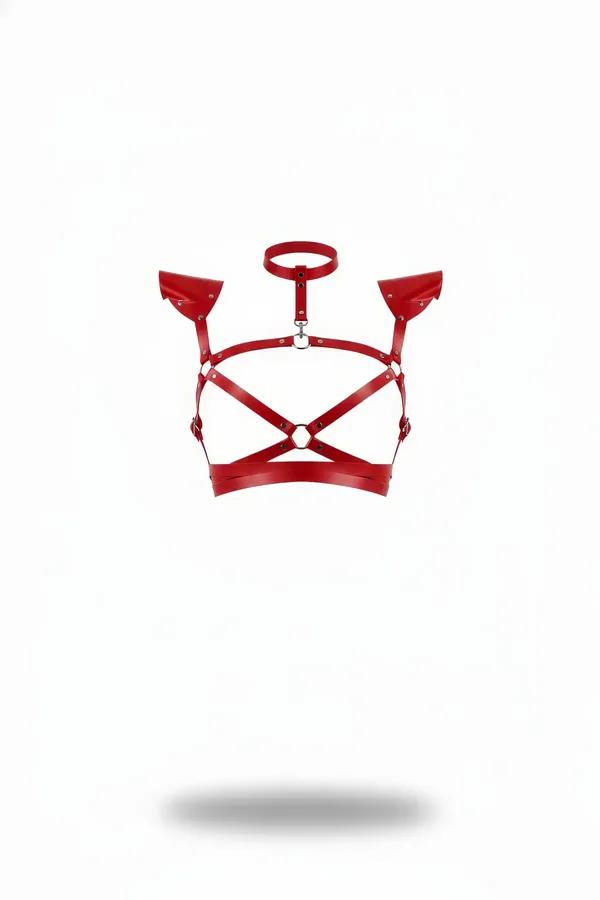 Red faux leather chest harness with structured winged shoulder panels, silver O-rings, cross-strap front, and choker collar