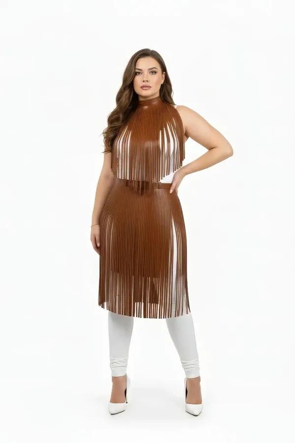 Brown faux leather body harness with two-tier vertical fringe and mock-neck collar, worn over white leggings