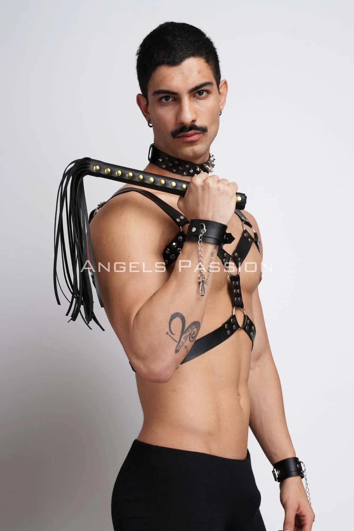 Rear view of black faux leather chest harness showing press-stud back closure and strap layout