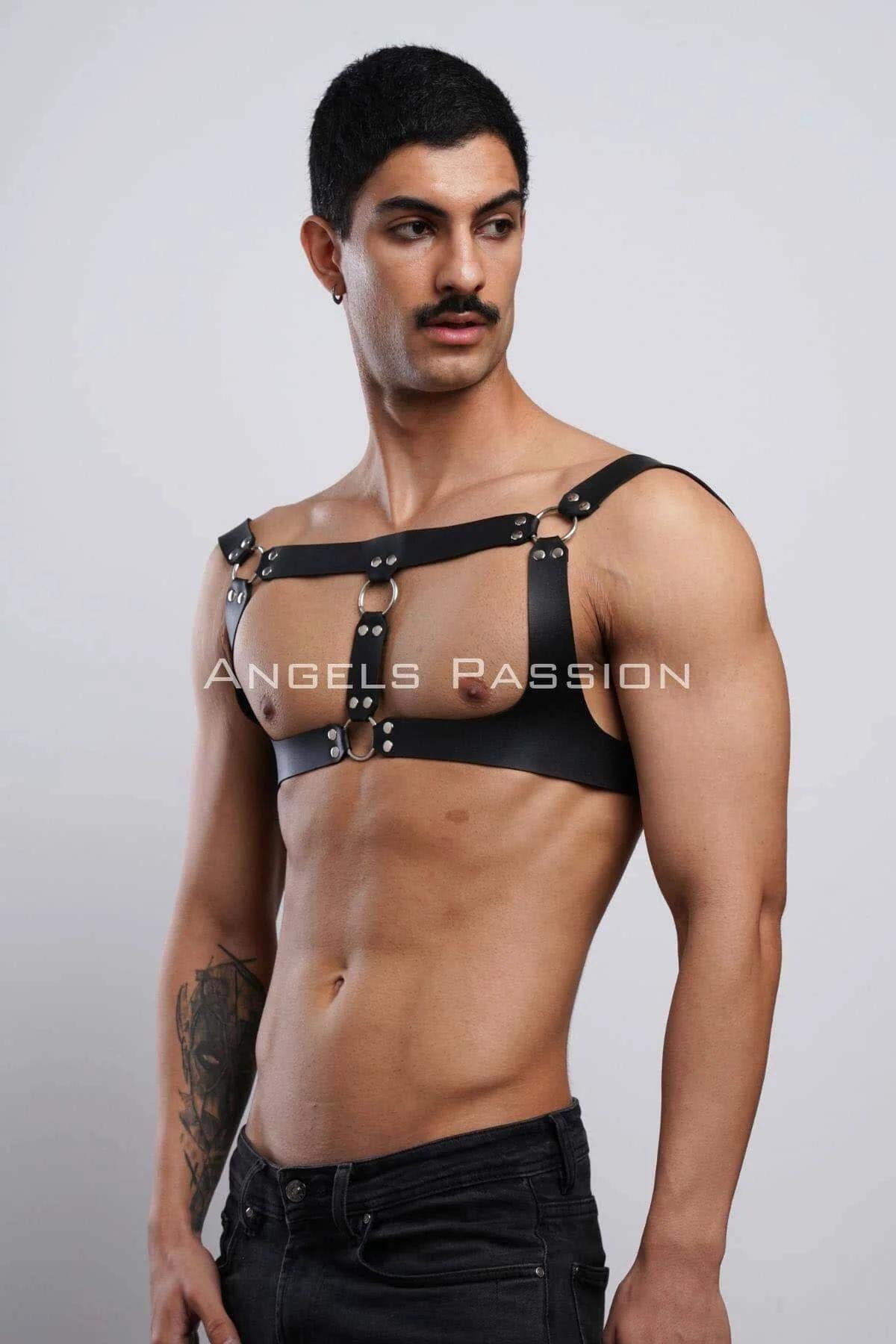 Close-up of silver dual O-ring bridge panel with dome rivet hardware on black faux leather harness