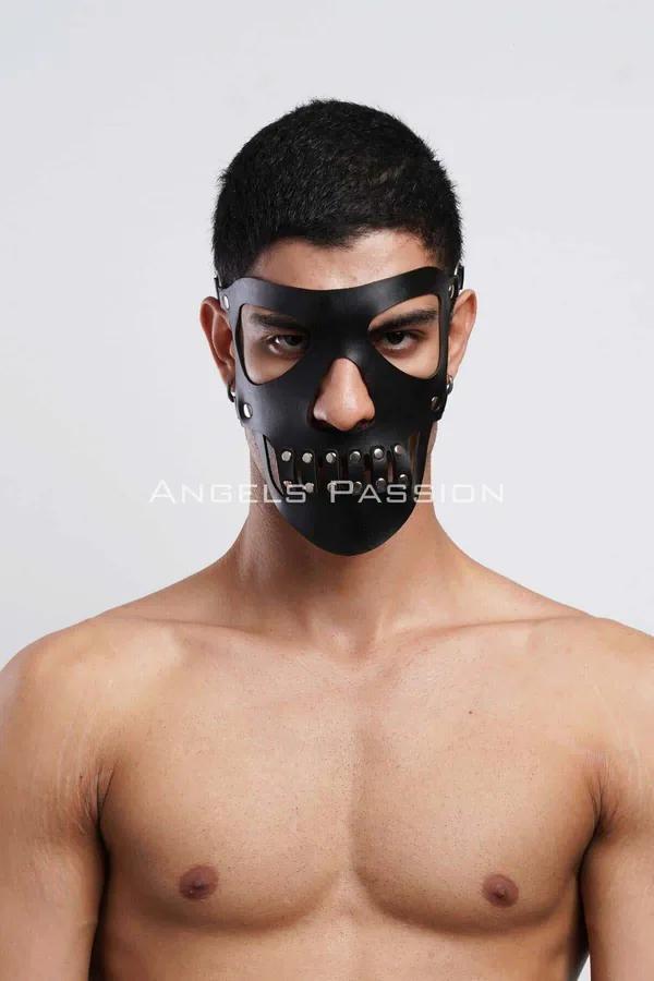 Black faux leather skull face mask with silver rivet row on lower jaw panel, worn by male model, white background