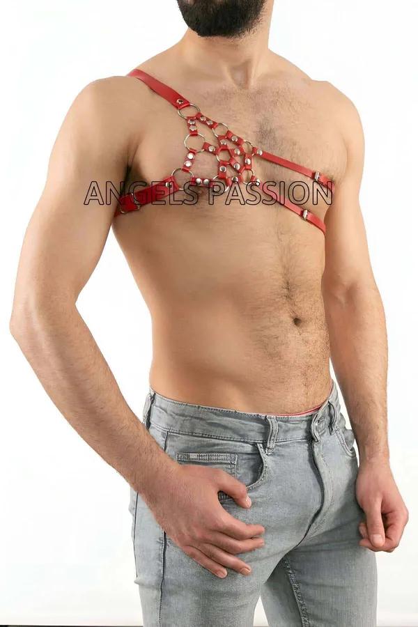 Red faux leather single shoulder harness with seven silver O-rings diagonal chest strap on male model