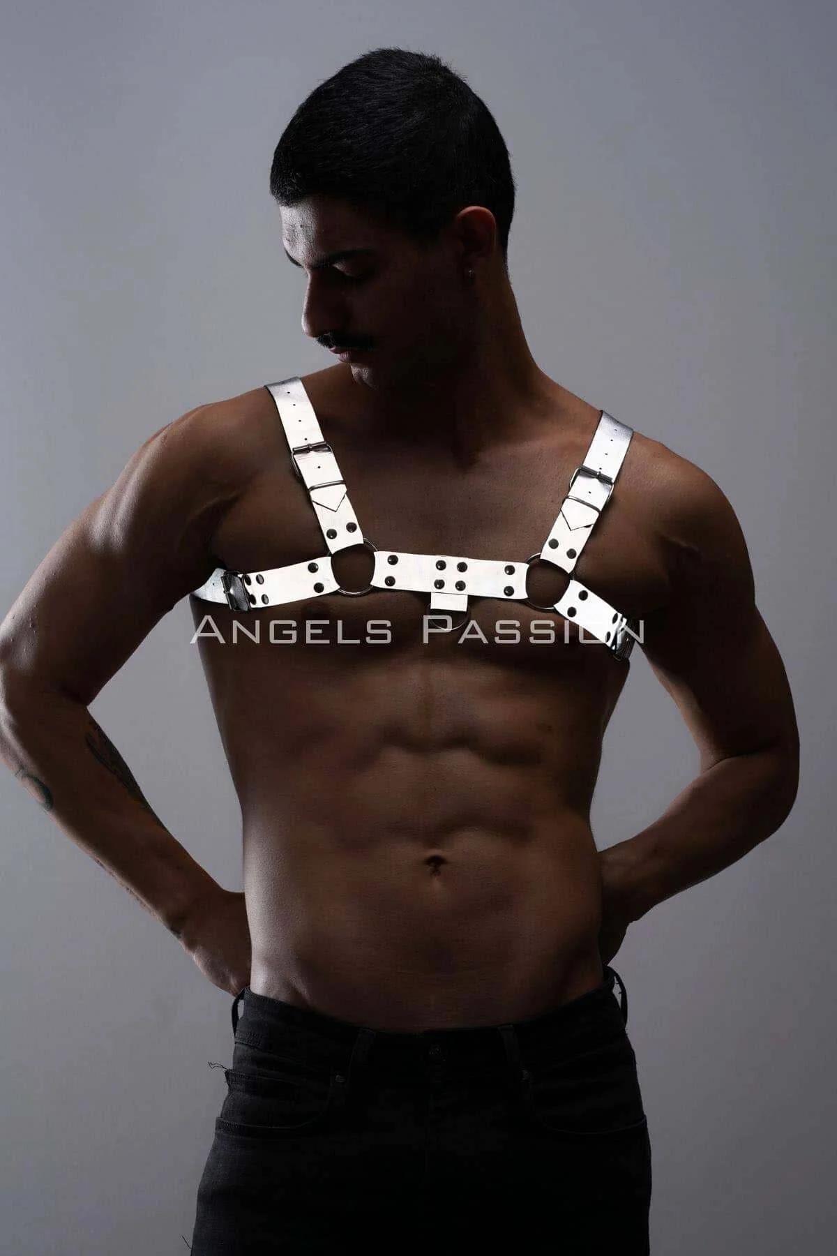White reflective chest harness with black metal O-rings and stud rivets worn by male model