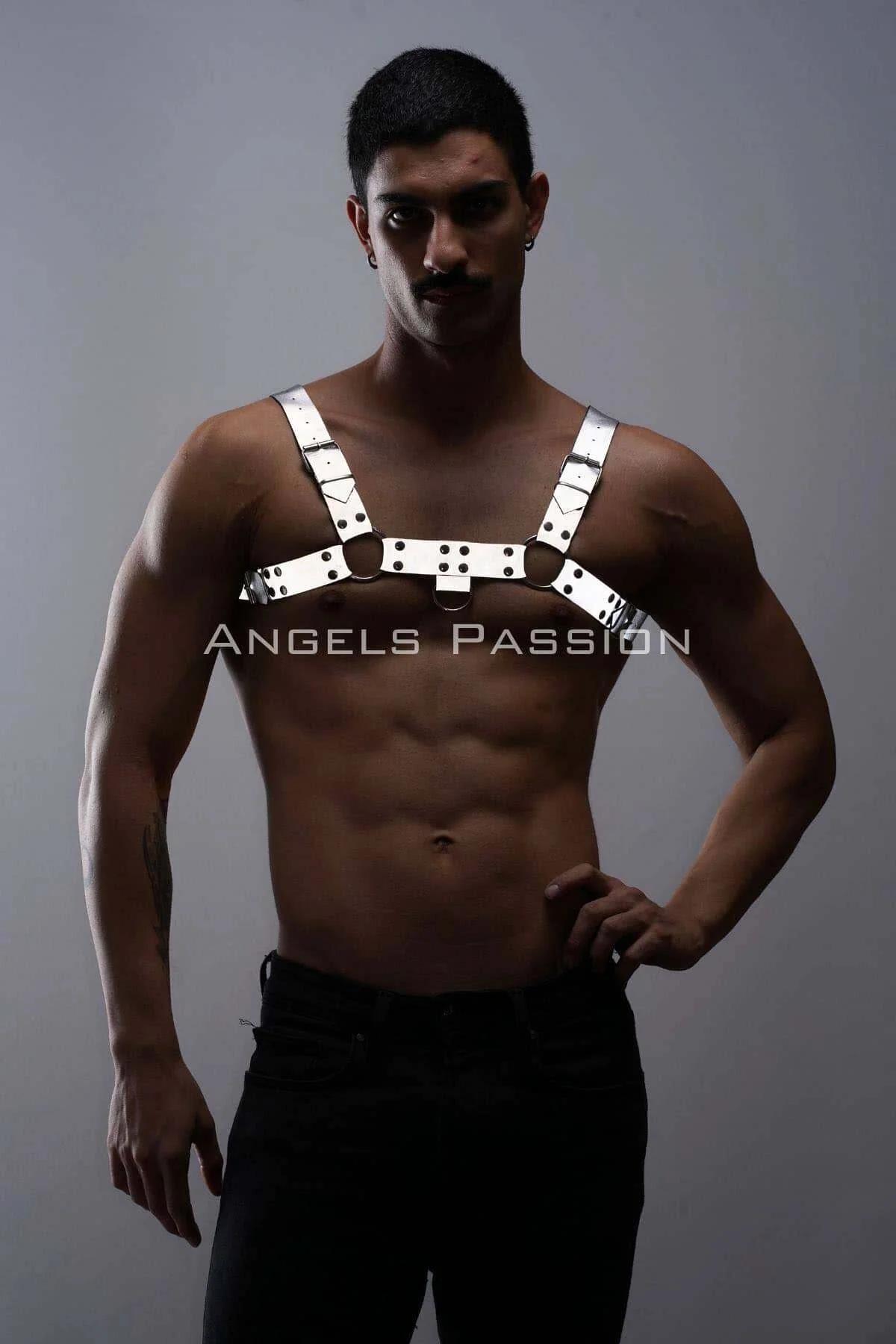 Front view of white reflective chest harness showing dual O-ring center junction on male torso