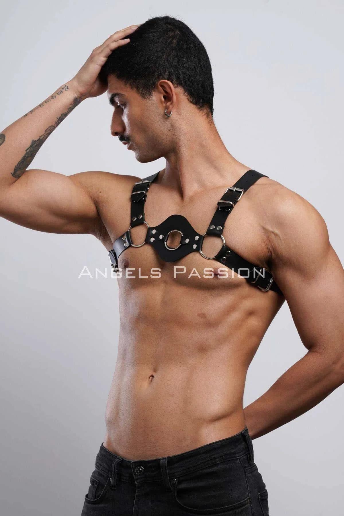 side angle black chest harness with adjustable silver buckle shoulder strap over bare chest