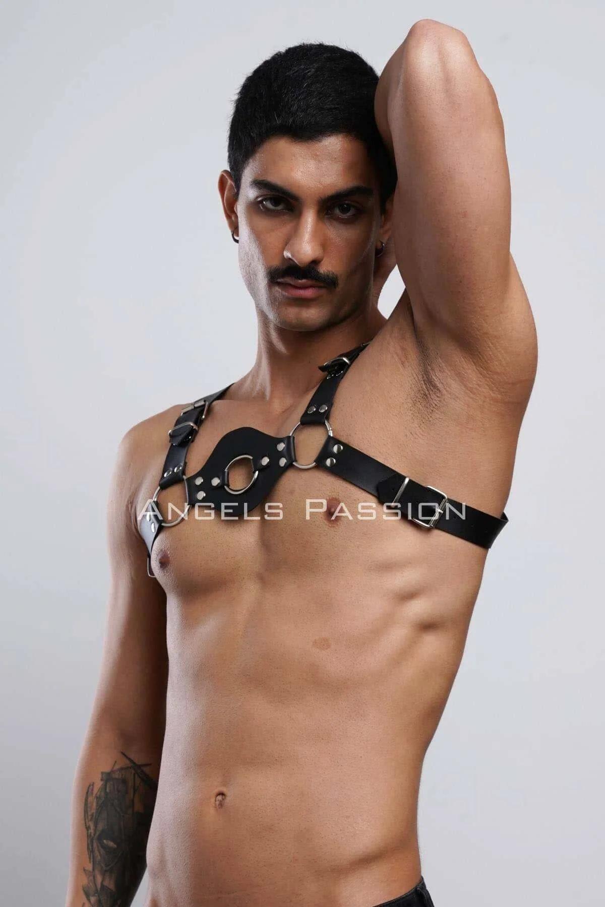 full torso view black faux leather chest panel harness styled with dark jeans