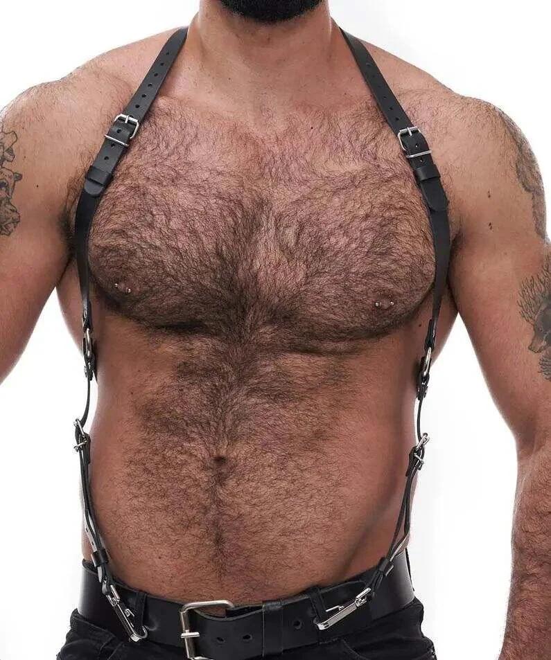 black faux leather Y-strap harness showing central chest connector plate and shoulder adjustment