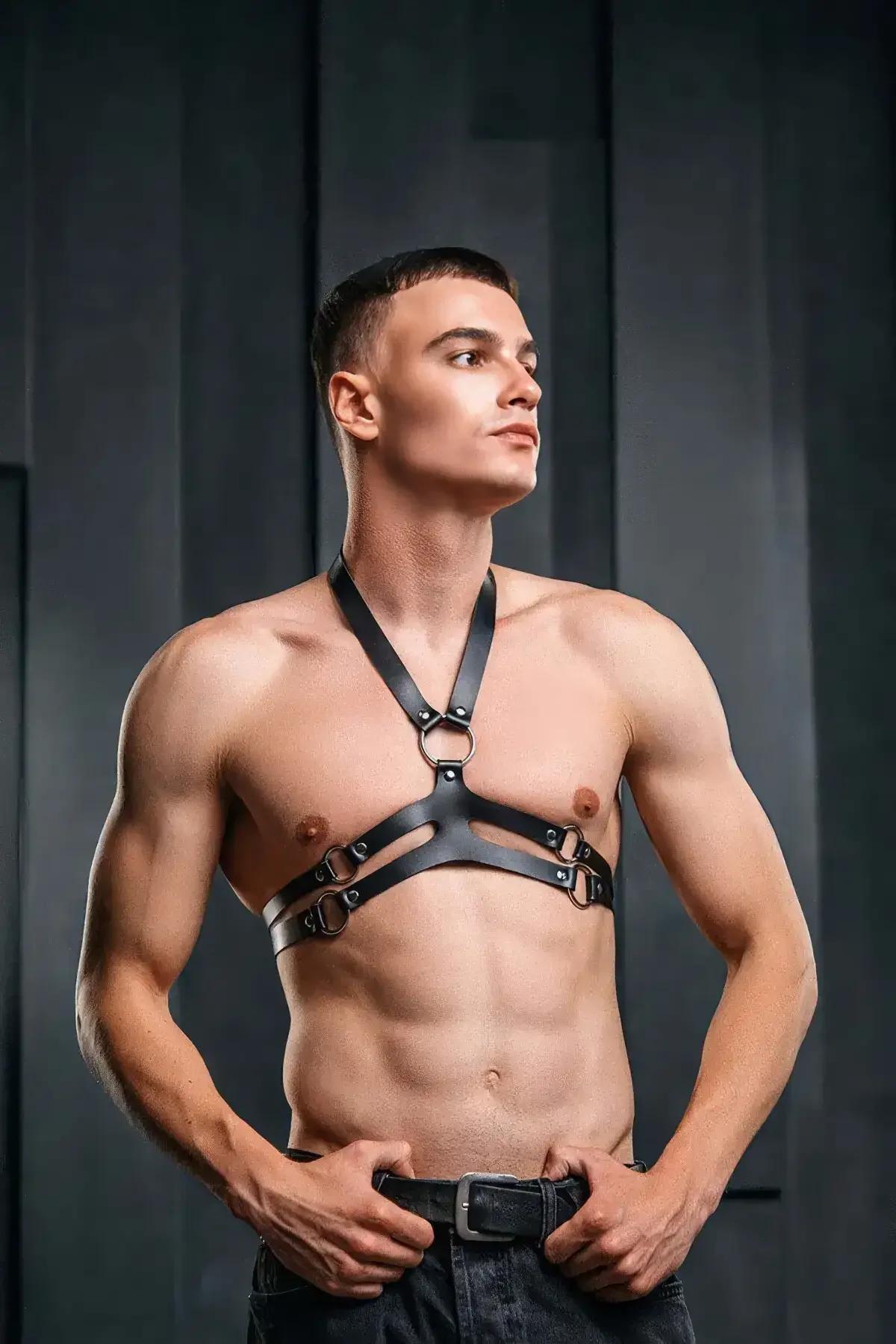 Double horizontal chest bands and lateral O-rings on black matte faux leather men's harness