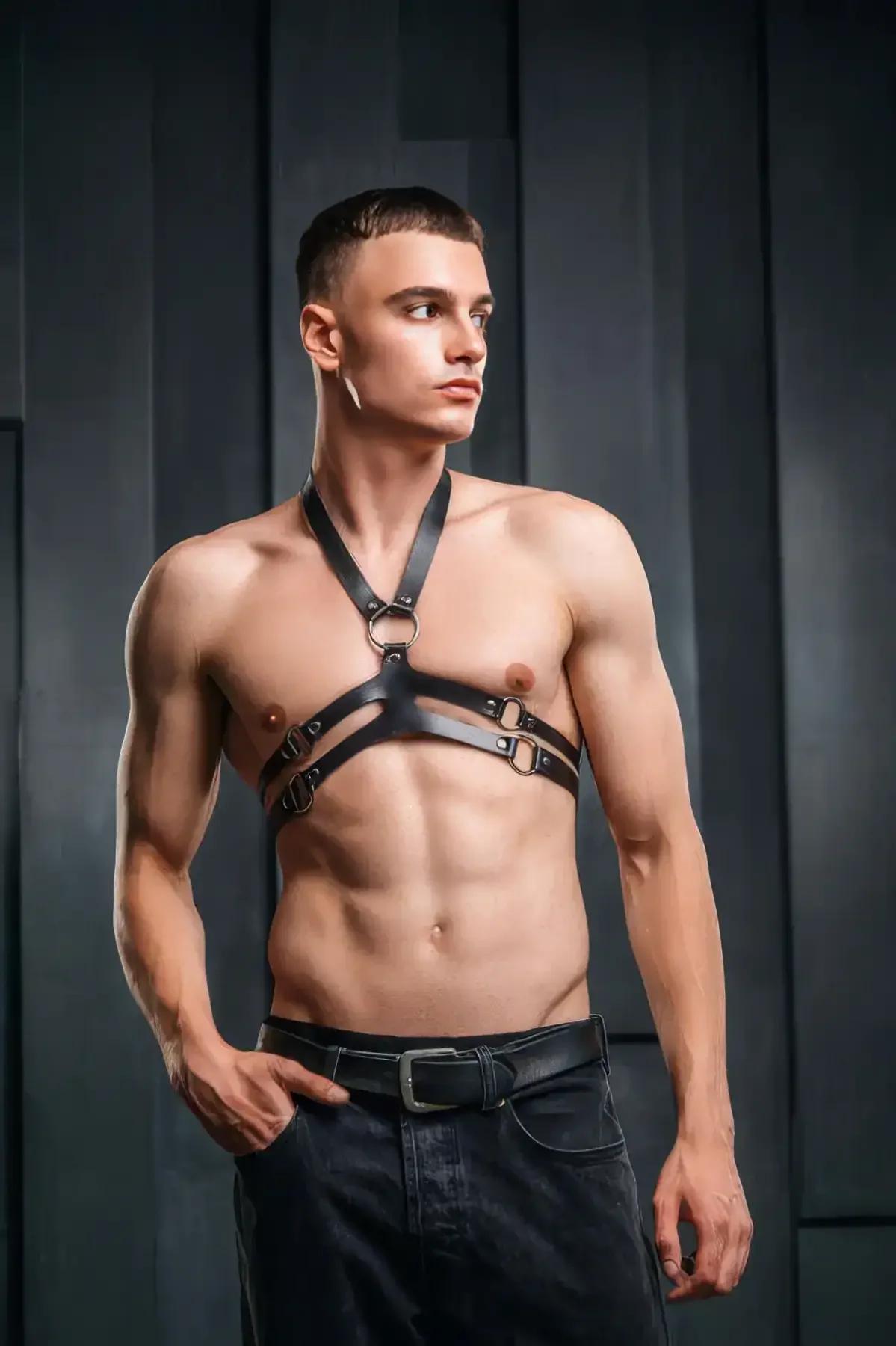 Adjustable back buckle closure on black faux leather chest harness for XS to 7XL fit