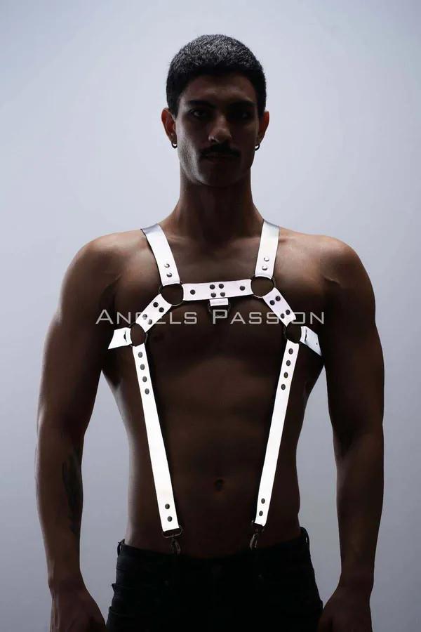 Reflective white faux leather chest and trouser harness set with O-ring and silver swivel clips worn by man