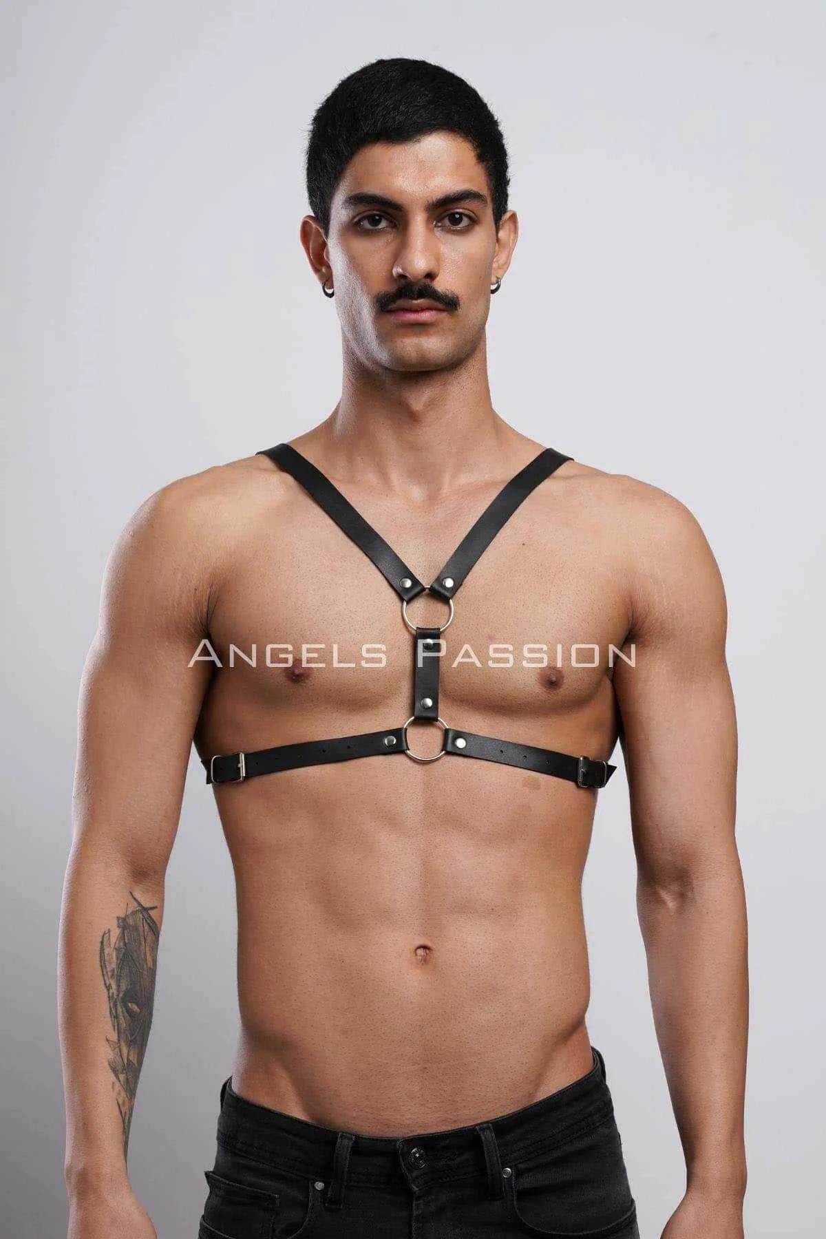 black Y-front body harness laid flat showing strap width and dual O-ring hardware