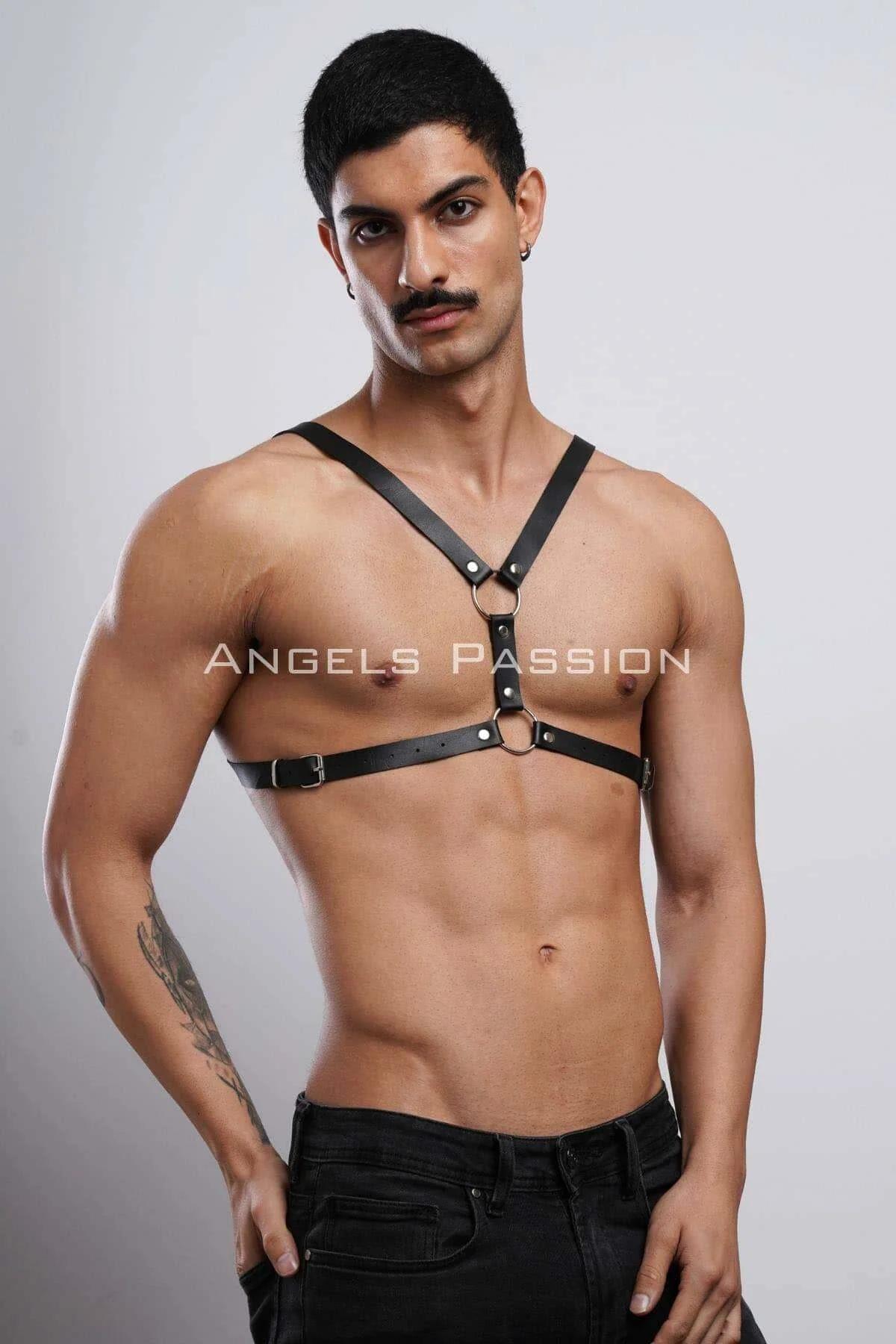 black leather chest harness worn over bare torso showing Y-front geometry and lower band fit