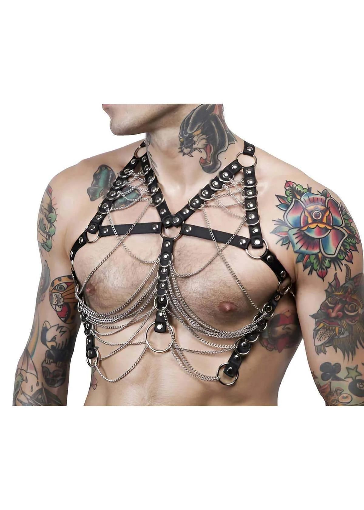 Close-up of silver dome studs on black PU leather strap of men chain harness
