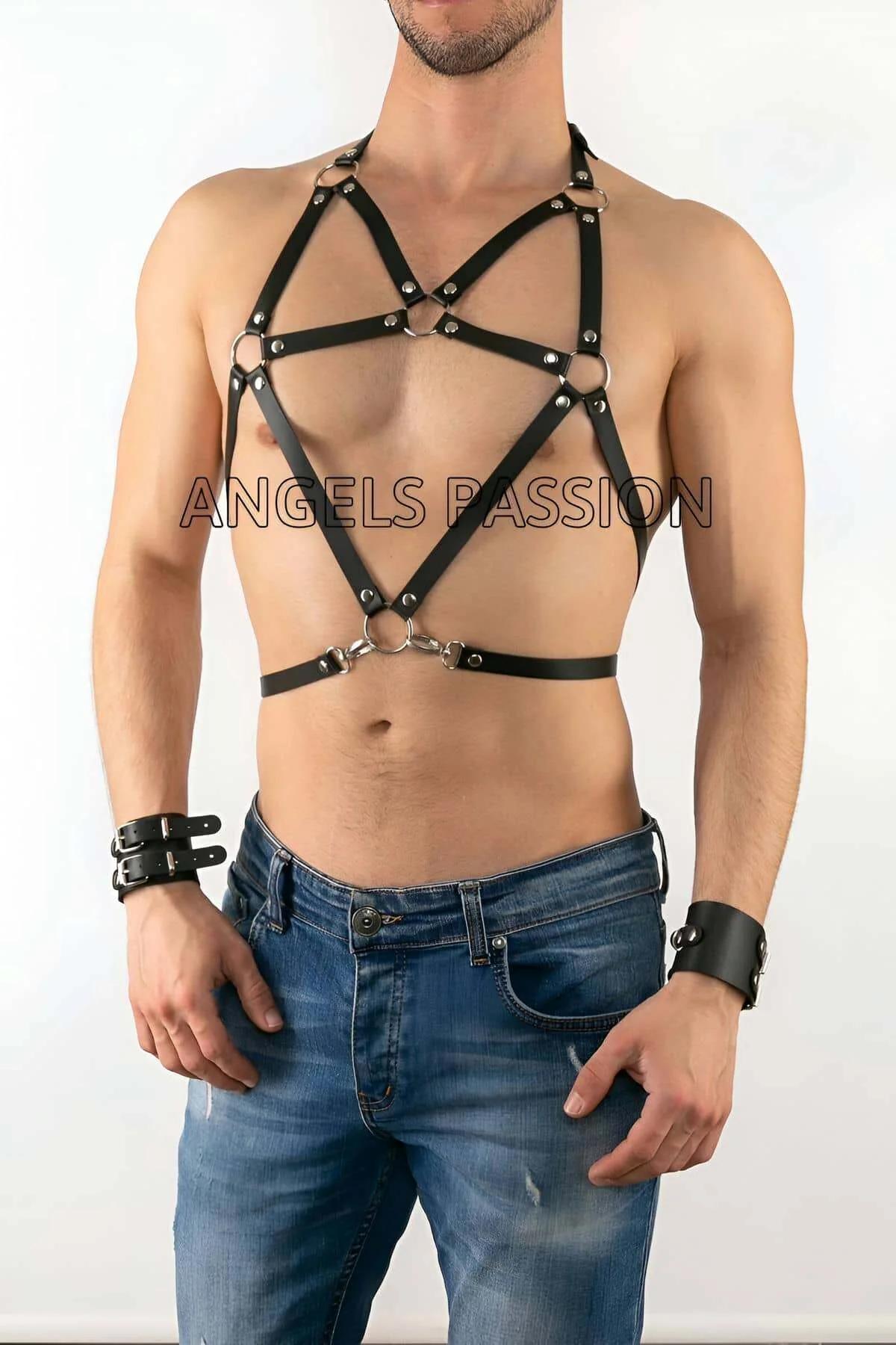 close-up of silver O-ring intersections on black pentagram faux leather harness straps