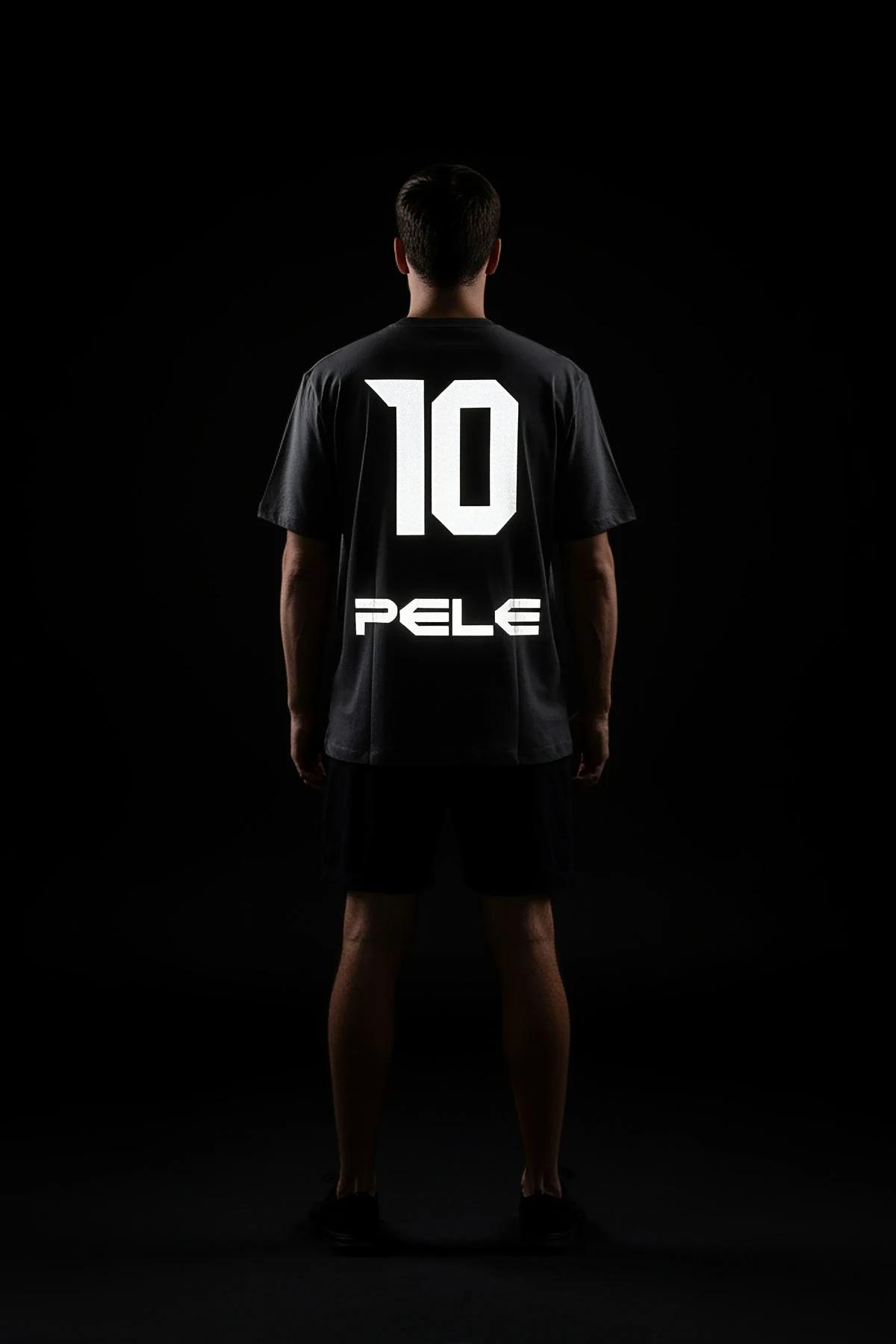 Black oversized custom sport jersey back view with large white reflective number 10 and name print in athletic block letters