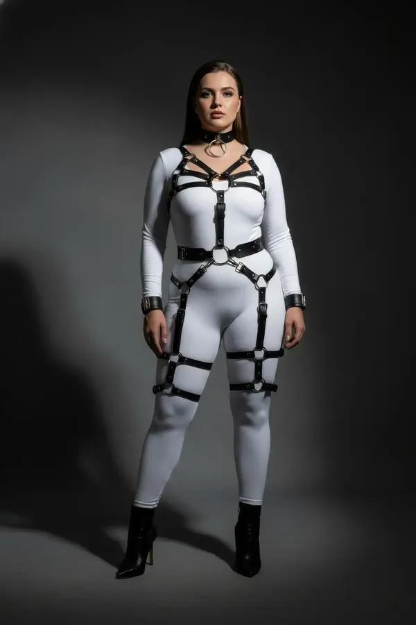 black vegan leather full body harness set with chest cage straps, O-ring waist belt, thigh and calf leg garters, silver buckl