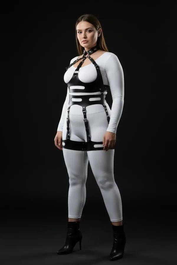 black vegan leather full body harness with O-ring choker collar, cutout chest panel, horizontal midriff bands, and four silve