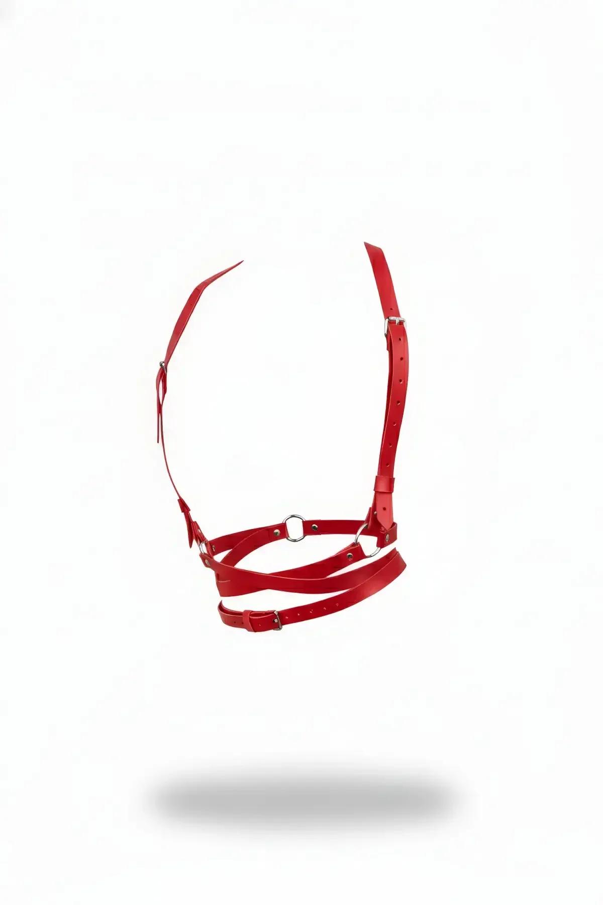 Red faux leather chest harness with silver O-ring center and adjustable multi-buckle straps on white background