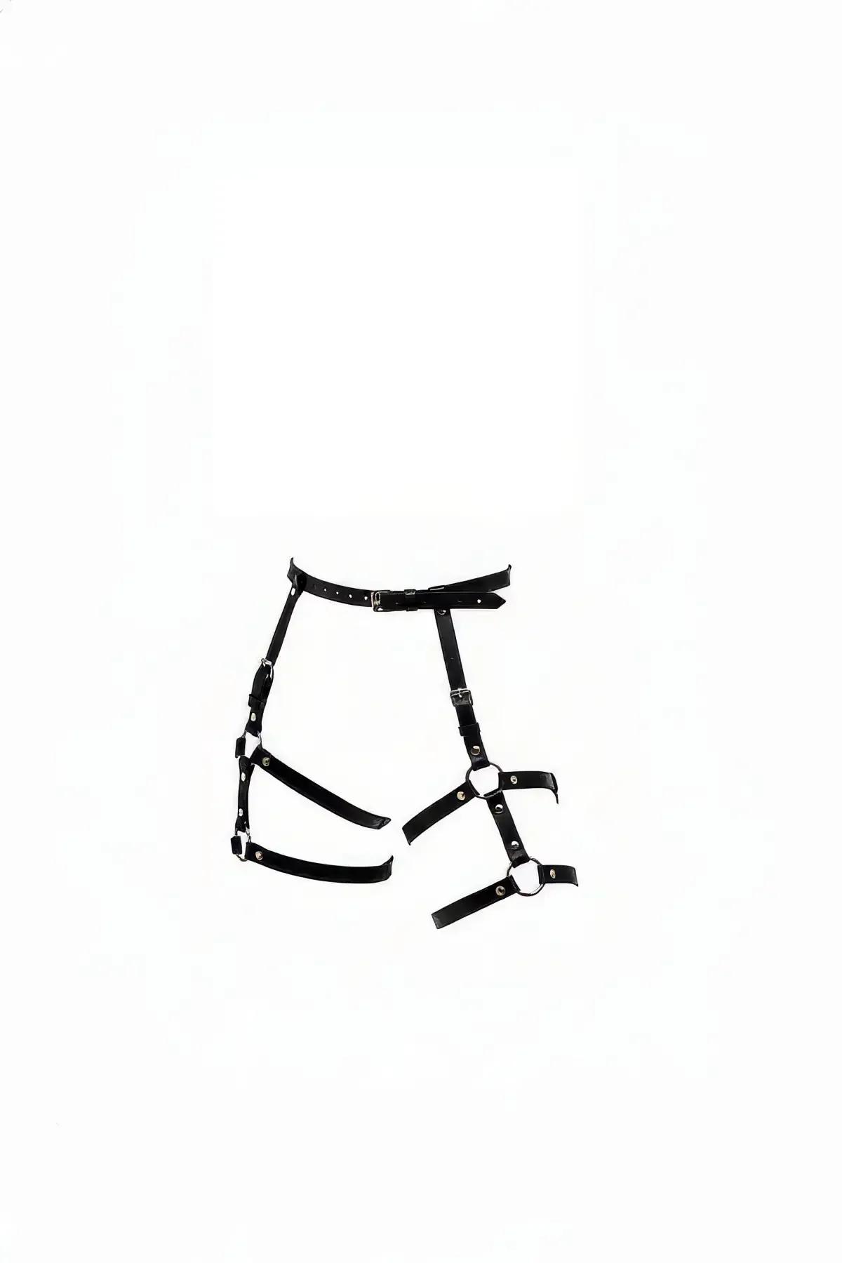 Black faux leather waist-to-thigh cage harness with silver O-rings and multi-buckle strappy construction