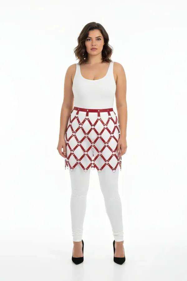 Burgundy faux leather geometric harness skirt with silver O-ring diamond lattice worn over white jeans