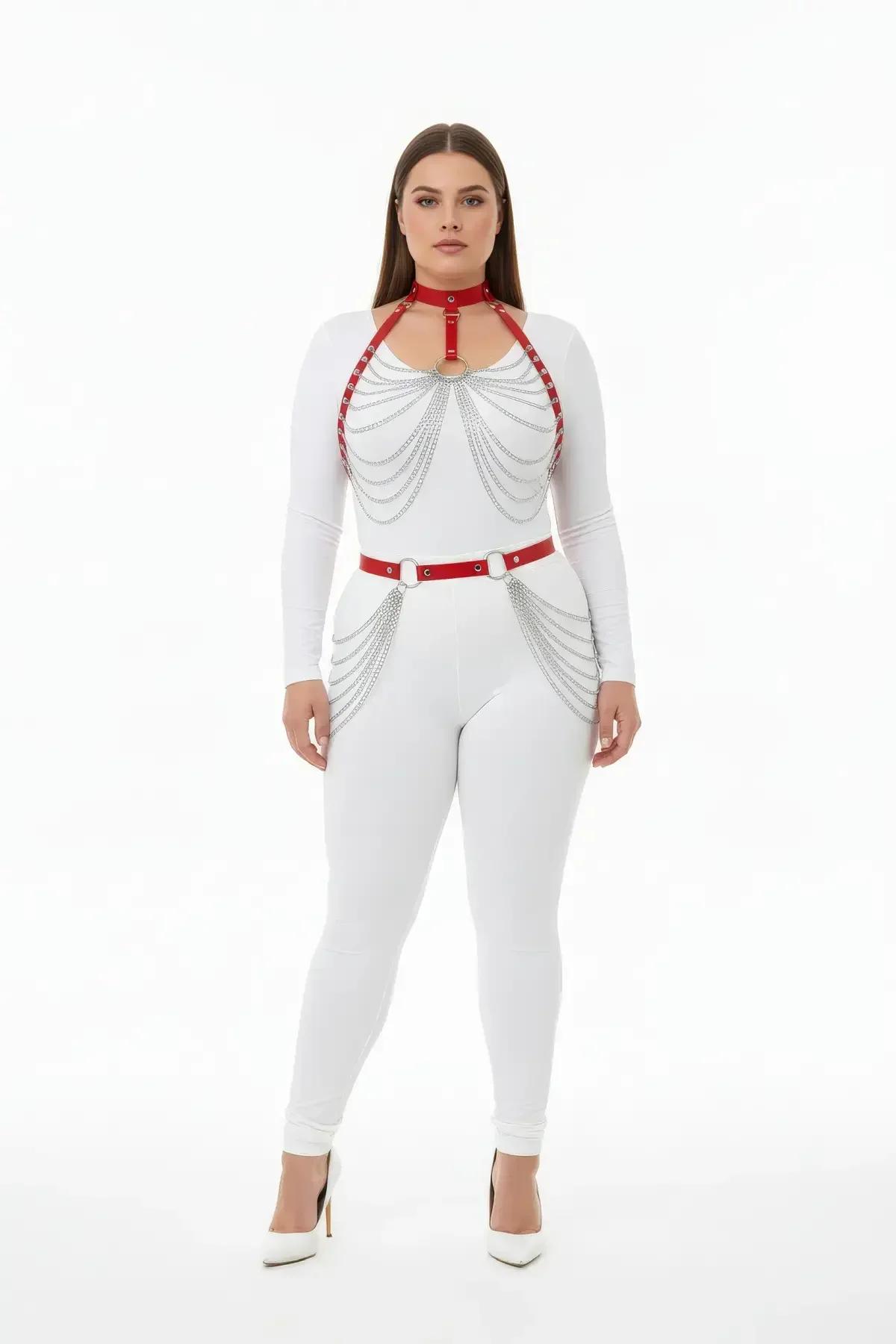 Red faux leather chest and waist harness set with cascading silver-tone chains, worn over white bodysuit