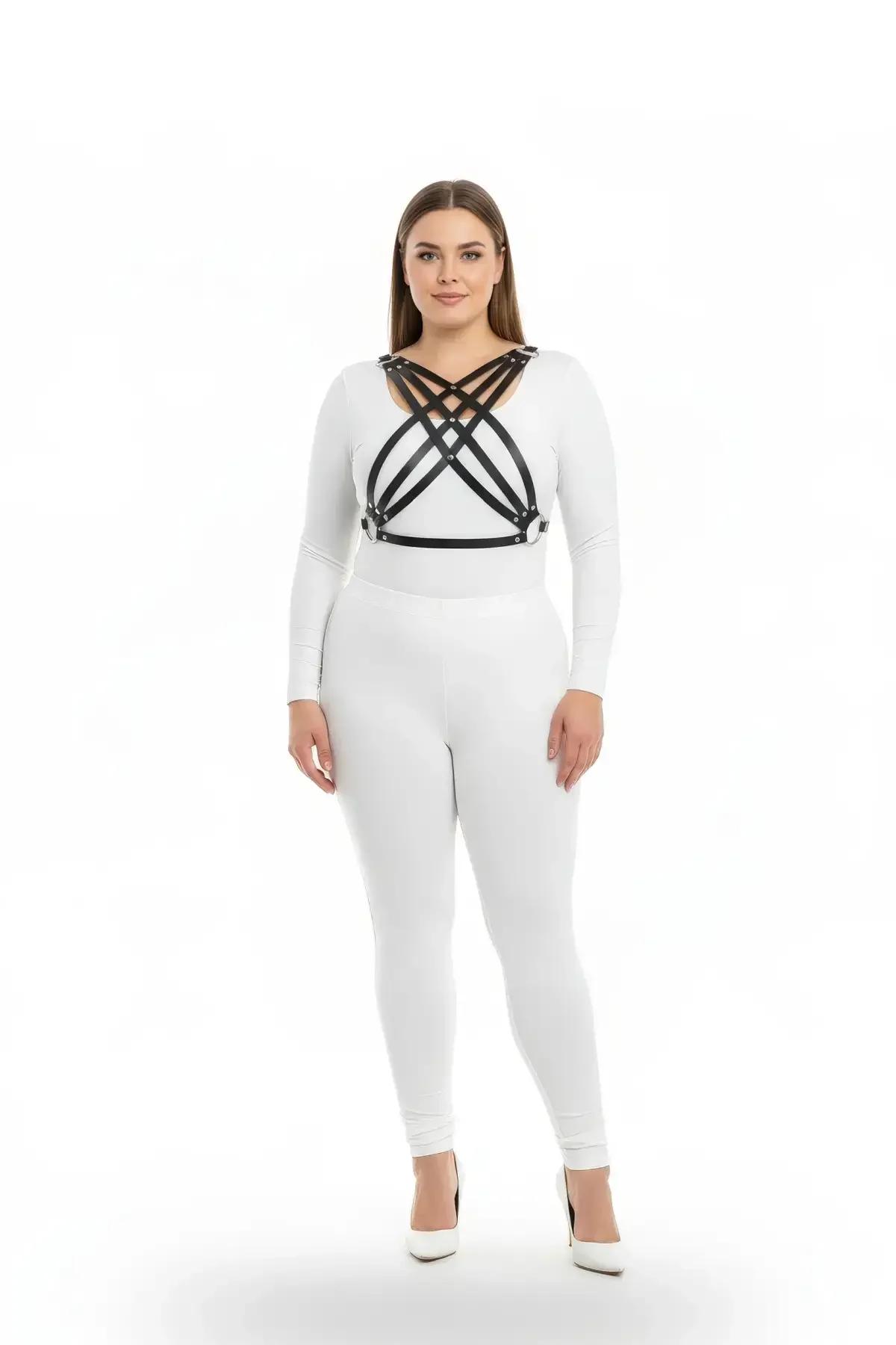 Black faux leather criss-cross chest harness with six-strap lattice diamond pattern and silver stud hardware worn over white