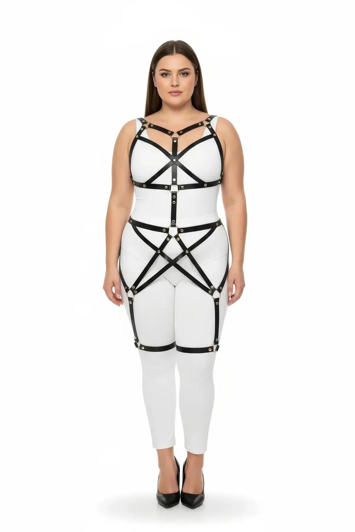 Black faux leather full body cage harness with gold O-rings and diagonal X-cross strap geometry from chest to thigh