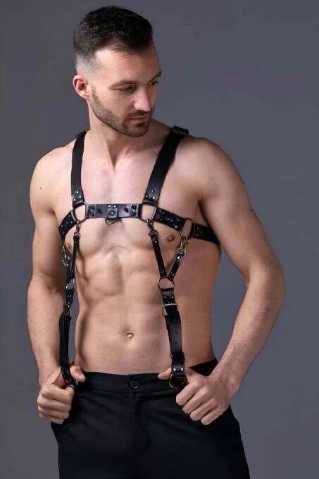 black faux leather multi-strap men's body harness with gold O-ring hardware shoulder to waist cage design