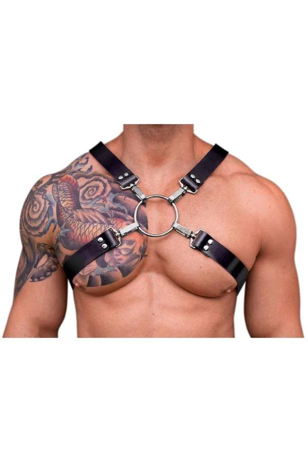 black faux leather x-strap chest harness with large silver o-ring center worn on male torso